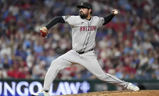 Arizona Diamondbacks' José Castillo pitches during the seventh inning of a baseball game against the Philadelphia Phillies, Friday, May 2, 2025, in Philadelphia. (AP Photo/Matt Slocum)