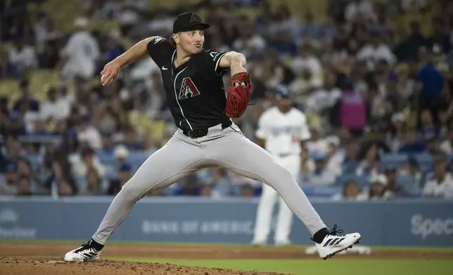Arizona Diamondbacks starting pitcher Brandon Pfaadt delivers during the third inning of a baseball game against the Los Angeles Dodgers in Los Angeles, Monday, May 19, 2025. (AP Photo/Kyusung Gong)