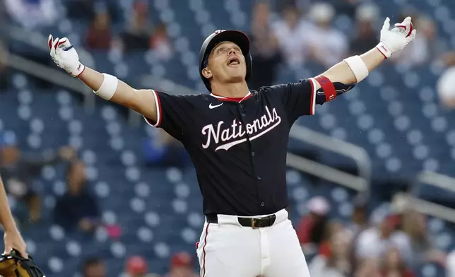 Washington Nationals' Alex Call celebrates his triple hit against Atlanta Braves pitcher AJ Smith-Shawver during the third inning of a baseball game in Washington, Thursday, May 22, 2025. (AP Photo/Terrance Williams)