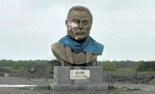 A statue of SpaceX founder Elon Musk on Saturday, May 3, 2025, is seen near the town of Boca Chica, Texas, that would become Starbase, Texas, if local residents approve a measure to make the area surrounding the rocket launch site its own city. (AP Photo/Valerie Gonzalez)