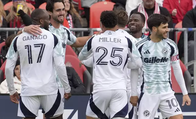 New England Revolution forward Leonardo Campana, second from left, celebrates his goal with teammates during the first half of an MLS soccer game against Toronto FC in Toronto, Saturday, May 3, 2025. (Frank Gunn/The Canadian Press via AP)