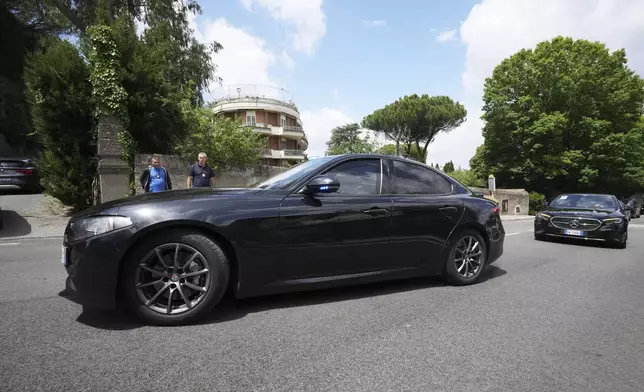 Iranian delegates arrive at the Omani Embassy in Rome for closed-door meeting with an U.S. delegation to discuss Tehran's rapidly advancing nuclear program, Friday, May 23, 2025. (AP Photo/Andrew Medichini)