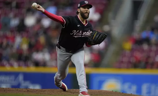 Washington Nationals pitcher Trevor Williams throws during the first inning of a baseball game against the Cincinnati Reds, Saturday, May 3, 2025, in Cincinnati. (AP Photo/Carolyn Kaster)