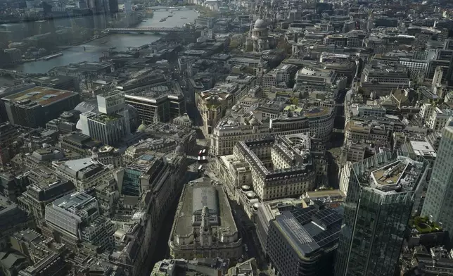 FILE - View of the Bank of England and the Royal Exchange from the Lookout viewing point, in London, Wednesday, April 9, 2025. (AP Photo/Alberto Pezzali, File)