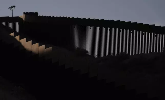 Two walls separate Mexico from the United States along the border Tuesday, Jan. 28, 2025, in Tijuana, Mexico. (AP Photo/Gregory Bull)