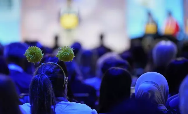 Audience members watch as spellers compete in the finals of the Scripps National Spelling Bee, Thursday, May 29, 2025, in Oxon Hill, Md. (AP Photo/Julia Demaree Nikhinson)