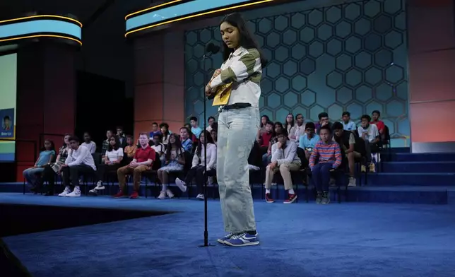 Harini Murali, 13, of Edison, N.J., competes in the finals of the Scripps National Spelling Bee at the Gaylord National Resort &amp; Convention Center Thursday, May 29, 2025, in Oxon Hill, Md. (AP Photo/Jose Luis Magana)