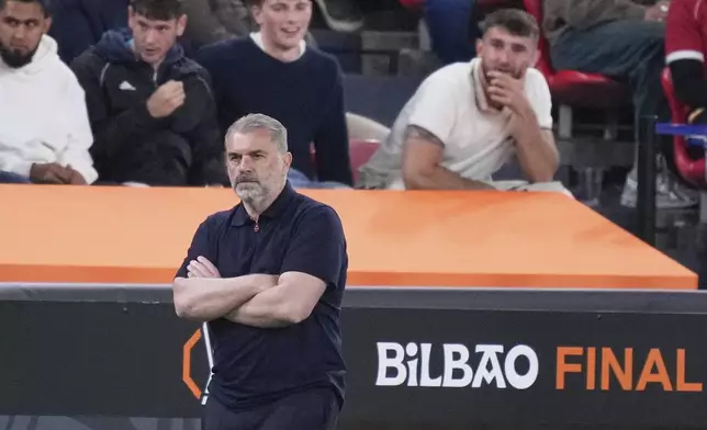 Tottenham's head coach Ange Postecoglou follows the game during the Europa League final soccer match between Tottenham Hotspur and Manchester United at the San Mames Stadium in Bilbao, Spain, Wednesday, May 21, 2025. (AP Photo/Jose Breton)