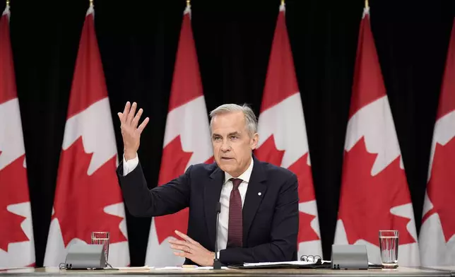 Prime Minister Mark Carney speaks during a news conference in Ottawa, Friday, May 2, 2025. (Adrian Wyld/The Canadian Press via AP)