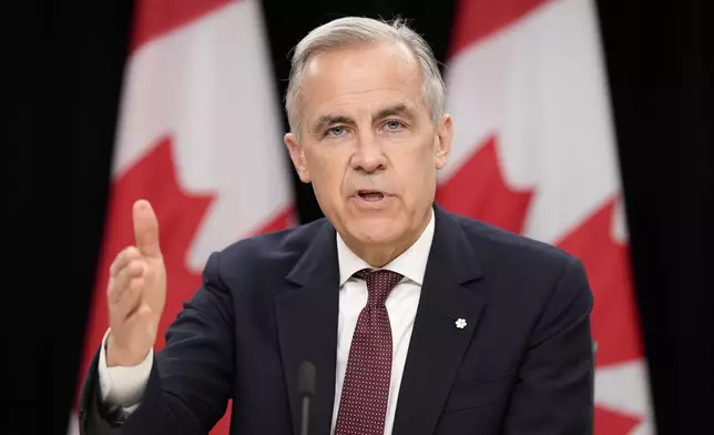 Prime Minister Mark Carney speaks during a news conference in Ottawa, Friday, May 2, 2025. (Adrian Wyld/The Canadian Press via AP)