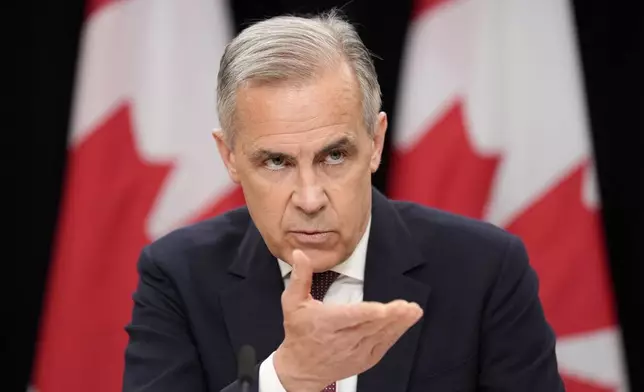 Prime Minister Mark Carney speaks during a news conference in Ottawa, Friday, May 2, 2025. (Adrian Wyld/The Canadian Press via AP)