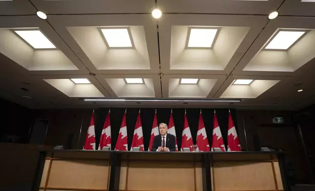 Prime Minister Mark Carney is seen during a news conference, in Ottawa, Friday, May 2, 2025. (Adrian Wyld /The Canadian Press via AP)