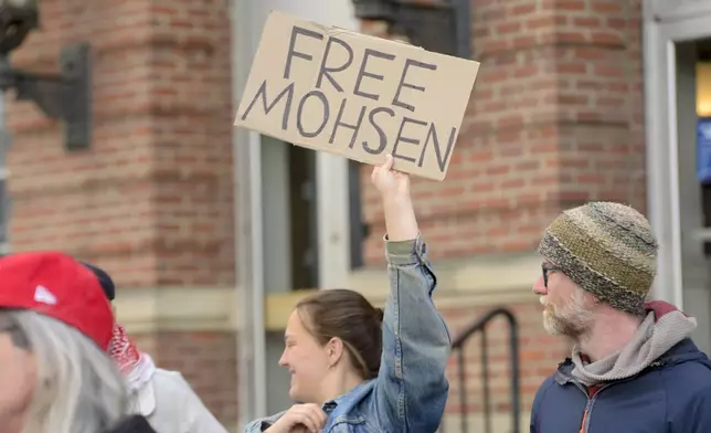 People gather outside the Post Office in Brattleboro, Vt., on Wednesday, April 30, 2025, to show support for Mohsen Mahdawi, who was scheduled to appear in U.S. District Court 11 in Burlington on Wednesday morning. (Kristopher Radder/The Brattleboro Reformer via AP) /The Brattleboro Reformer via AP)
