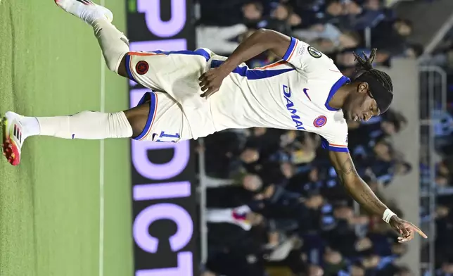 Chelsea's Noni Madueke celebrates after scoring his side's second goal during the Conference League semi-final first leg soccer match between Djurgardens IF and Chelsea FC in Stockholm, Sweden, Thursday, May 1, 2025. (Jonas Ekstroemer/TT News Agency via AP)
