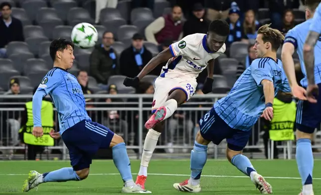 Chelsea's Tyrique George, center, plays the ball during the Conference League semi-final first leg soccer match between Djurgardens IF and Chelsea FC in Stockholm, Sweden, Thursday, May 1, 2025. (Jonas Ekstroemer/TT News Agency via AP)