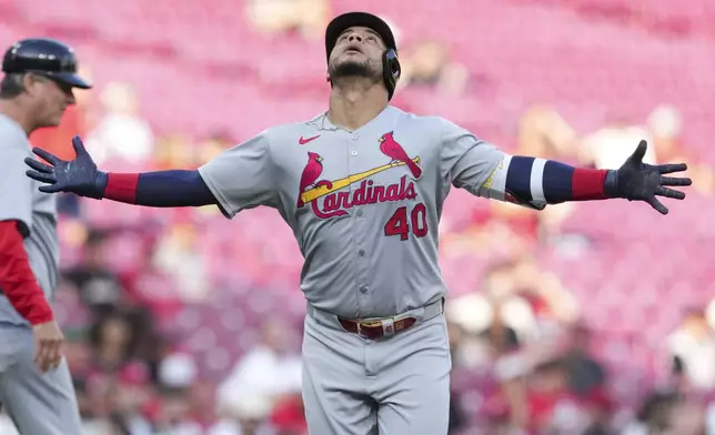 St. Louis Cardinals' Willson Contreras (40) gestures as he rounds the bases after hitting a three-run home run during the first inning of the second baseball game of a doubleheader against the Cincinnati Reds Wednesday, April 30, 2025, in Cincinnati. (AP Photo/Jeff Dean)