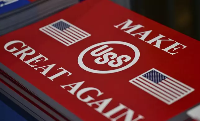 Signs are photographed before President Donald Trump speaks at United States Steel Corporation's Mon Valley Works-Irvin Plant, Friday, May 30, 2025, in West Mifflin, Pa. (AP Photo/David Dermer)