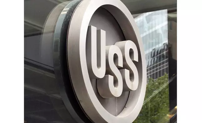 FILE - The United States Steel logo is pictured outside the headquarters building in downtown Pittsburgh, April 26, 2010. (AP Photo/Gene J. Puskar, File)