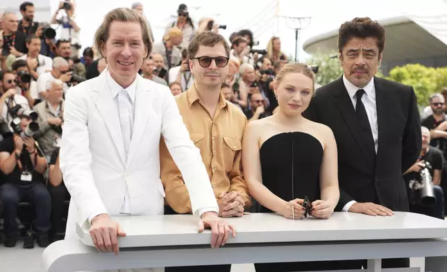Director Wes Anderson, from left, Michael Cera, Mia Threapleton and Benicio del Toro pose for photographers at the photo call for the film 'The Phoenician Scheme' at the 78th international film festival, Cannes, southern France, Monday, May 19, 2025. (Photo by Scott A Garfitt/Invision/AP)