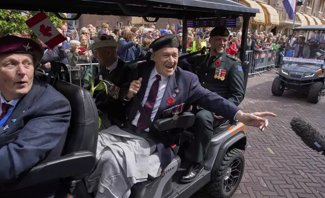 Dozens of World War II veterans take part in a parade to mark Liberation Day in Wageningen, Netherlands, Monday, May 5, 2025. (AP Photo/Peter Dejong)
