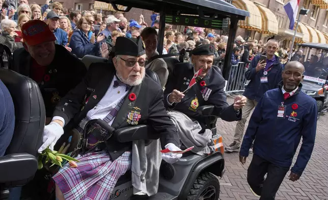 Canadian World War II veterans take part in a parade to mark Liberation Day in Wageningen, Netherlands, Monday, May 5, 2025. (AP Photo/Peter Dejong)