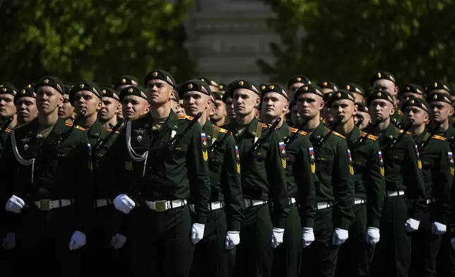Russian servicemen stand in formation in Red Square during the Victory Day military parade in Moscow, Russia, Friday, May 9, 2025, during celebrations of the 80th anniversary of the Soviet Union's victory over Nazi Germany during the World War II. (AP Photo/Pavel Bednyakov, Pool)