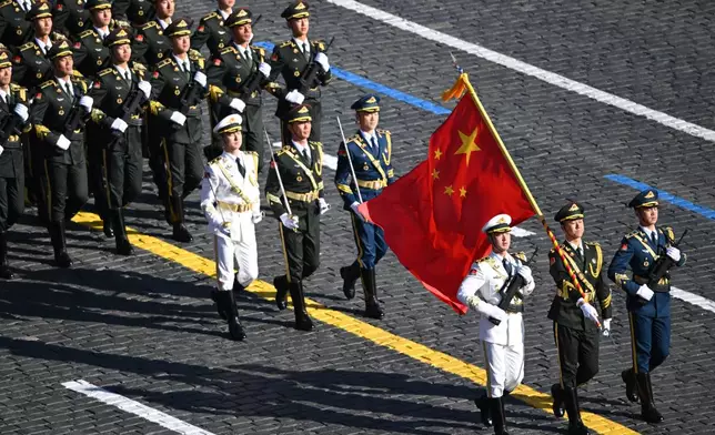 Chinese servicemen attend the Victory Day military parade in Moscow, Russia, Friday, May 9, 2025, during celebrations of the 80th anniversary of the Soviet Union's victory over Nazi Germany during the World War II. (Maxim Bogodvid/Photo host agency RIA Novosti via AP)