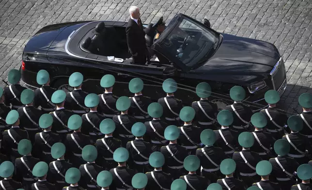 Russian Defense Minister Andrei Belousov is driven along Red Square in an Aurus car during the Victory Day military parade in Moscow, Russia, Friday, May 9, 2025, marking the 80th anniversary of the Soviet Union's victory over Nazi Germany during the World War II. (Vladimir Astapkovich/Photo host agency RIA Novosti via AP)