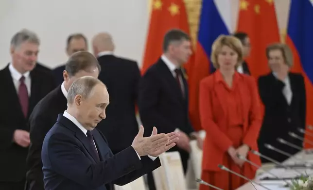 Russian President Vladimir Putin gestures during talks with his Chinese counterpart Xi Jinping at the Kremlin in Moscow, Russia, Thursday, May 8, 2025, ahead of celebrations of the 80th anniversary of the Soviet Union's victory over Nazi Germany during the World War II. (Kirill Kudryavtsev/Pool Photo via AP)