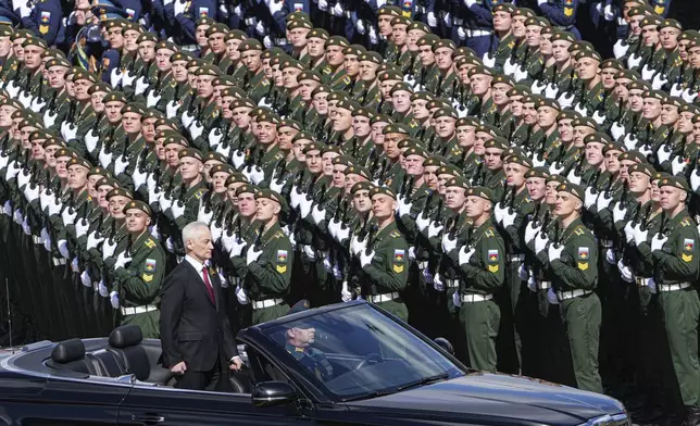 Russian Defense Minister Andrei Belousov is driven along Red Square in an Aurus car during the Victory Day military parade in Moscow, Russia, Friday, May 9, 2025, marking the 80th anniversary of the Soviet Union's victory over Nazi Germany during the World War II. (Alexander Wilf/Photo host agency RIA Novosti via AP)