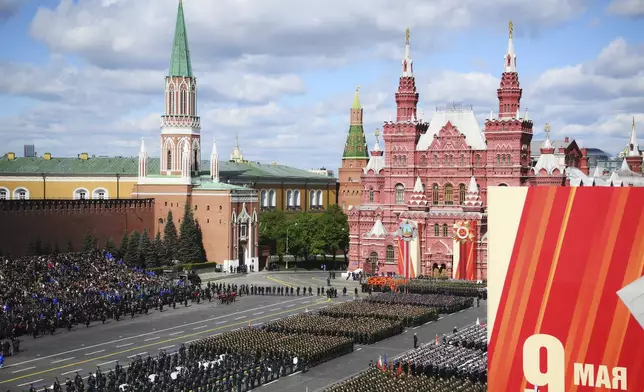 Military troops stand in formation in Red Square before the Victory Day military parade in Moscow, Russia, Friday, May 9, 2025, during celebrations of the 80th anniversary of the Soviet Union's victory over Nazi Germany during the World War II. (Alexey Maishev/Photo host agency RIA Novosti via AP)