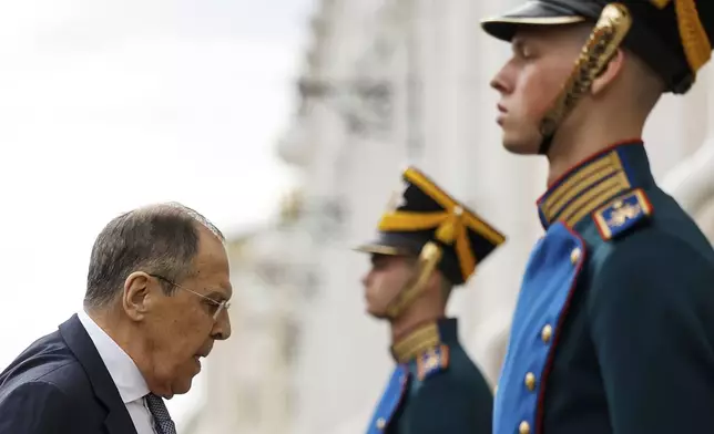 Russian Foreign Minister Sergey Lavrov, left, arrives for a meeting of Venezuelan President Nicolas Maduro and Russian President Vladimir Putin at the Kremlin in Moscow, Russia, Wednesday, May 7, 2025, ahead of celebrations of the 80th anniversary of the Soviet Union's victory over Nazi Germany during the World War II. (Maxim Shemetov/Pool Photo via AP)
