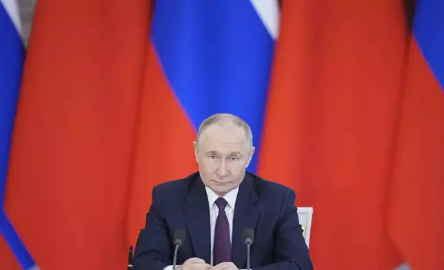 Russian President Vladimir Putin attends a signing ceremony with Chinese President Xi Jinpin at the Kremlin in Moscow, Russia, Thursday, May 8, 2025, ahead of celebrations of the 80th anniversary of the Soviet Union's victory over Nazi Germany during the World War II. (AP Photo/Pavel Bednyakov)