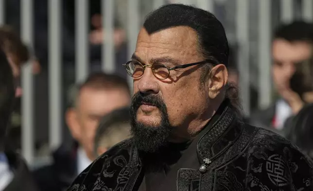 US action-movie actor Steven Seagal arrives for the Victory Day military parade in Moscow, Russia, Friday, May 9, 2025, during celebrations of the 80th anniversary of the Soviet Union's victory over Nazi Germany during the World War II. (AP Photo/Pavel Bednyakov, Pool)