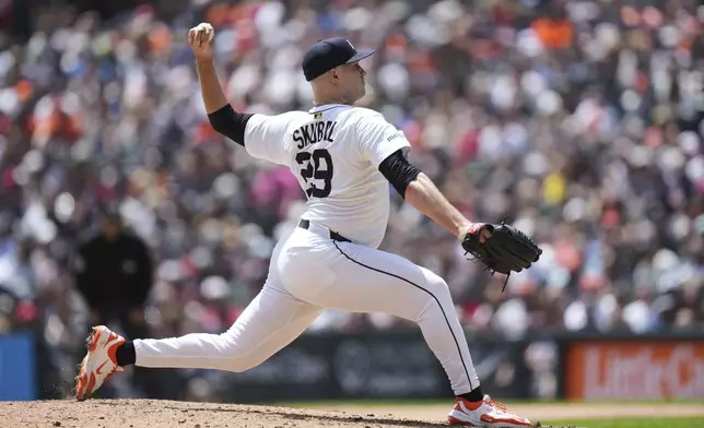Detroit Tigers pitcher Tarik Skubal throws against the Cleveland Guardians in the ninth inning during a baseball game, Sunday, May 25, 2025, in Detroit. (AP Photo/Paul Sancya)