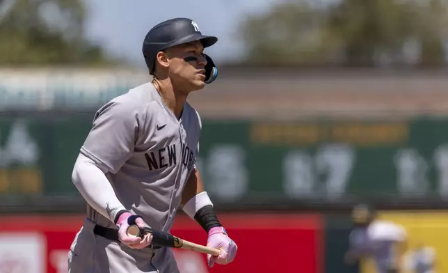 New York Yankees' Aaron Judge (99) walks back to the dugout after striking out during the first inning of a baseball game against the Athletics, Saturday, May 10, 2025, in West Sacramento, Calif. (AP P against the Athleticshoto/Sara Nevis)
