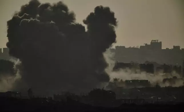 Smoke rises to the sky following an Israeli bombardment in the Gaza Strip as seen from southern Israel, Thursday, May 22, 2025. (AP Photo/Leo Correa)