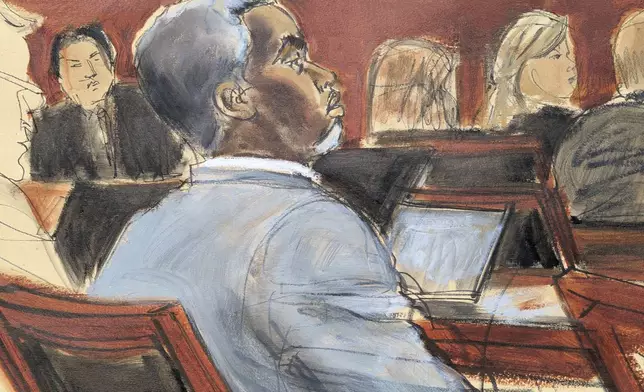 Sean Diddy Combs listens during opening statements on the first day of trial in Manhattan federal court, Monday, May 12, 2025, in New York. (Elizabeth Williams via AP)