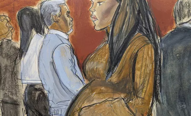 Cassie Ventura, right, walks out of the courtroom past Sean Diddy Combs after testifying in Manhattan federal court, Tuesday, May 13, 2025, in New York. (Elizabeth Williams via AP)