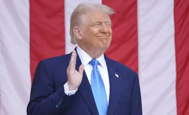 President Donald Trump attends the 157th National Memorial Day Observance at Arlington National Cemetery, Monday, May 26, 2025, in Arlington, Va. (AP Photo/Jacquelyn Martin)