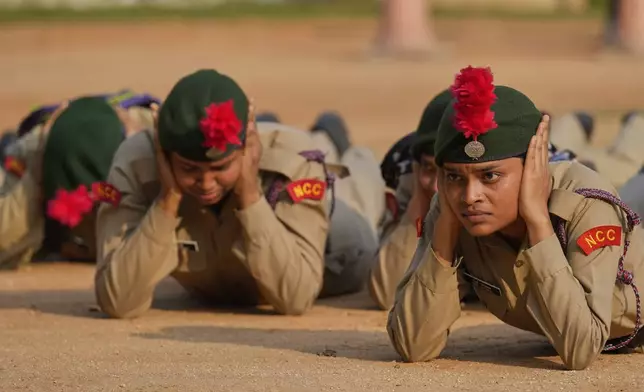 National Cadet Corps members participate during a mock drill to train civilians and security personnel to respond in case of attack, in Guwahati, India, Wednesday, May 7, 2025 amid rising fears of wider conflict following India's strikes in Pakistan. (AP Photo/Anupam Nath)