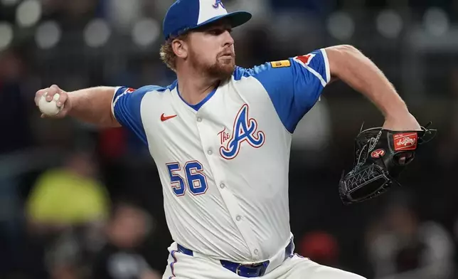 Atlanta Braves pitcher Spencer Schwellenbach (56) delivers against the Los Angeles Dodgers in the first inning of a baseball game, Saturday, May 3, 2025, in Atlanta. (AP Photo/Mike Stewart)