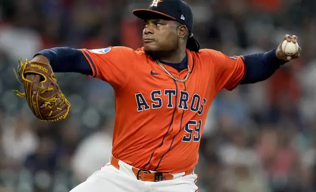 Houston Astros starting pitcher Framber Valdez throws against the Tampa Bay Rays during the first inning of a baseball game Friday, May 30, 2025, in Houston. (AP Photo/Eric Christian Smith)