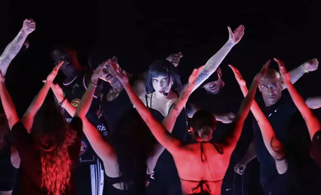 Lady Gaga takes part in a rehearsal a day ahead of her free concert, on Copacabana beach, in Rio de Janeiro, Friday, May 2, 2025. (AP Photo/Bruna Prado)