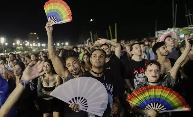 Fans cheer as they watch Lady Gaga free concert on Copacabana beach, in Rio de Janeiro, Saturday, May 3, 2025. (AP Photo/Bruna Prado)