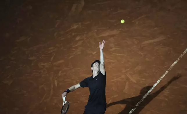 Italy's Jannik Sinner serves during a round of sixteen match against Argentina's Francisco Cerundolo at the Italian Open tennis tournament in Rome, Tuesday, May 13, 2025. (AP Photo/Andrew Medichini)