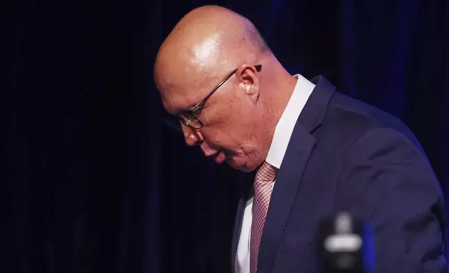 Australian Liberal Party leader Peter Dutton walks from the stage after making a concession speech following the general election in Brisbane, Australia, Saturday, May 3, 2025. (AP Photo/Pat Hoelscher)