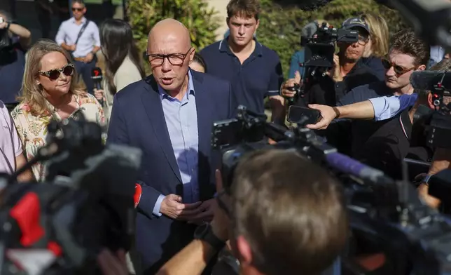 Australian Liberal Party leader Peter Dutton talks to the media after voting in his electorate in Brisbane, Australia, Saturday, May 3, 2025. (AP Photo/Pat Hoelscher)