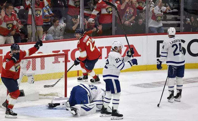 Florida Panthers center Carter Verhaeghe (23) celebrates after scoring during the first period of Game 4 of a second-round NHL hockey playoff series against the Toronto Maple Leafs, Sunday, May 11, 2025, in Sunrise, Fla. (AP Photo/Michael Laughlin)