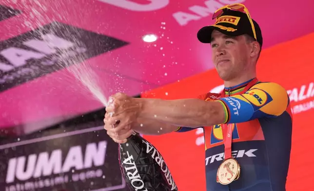 Mads Pedersen of Lidl-Trek celebrates winning stage 1 of the Giro d'Italia from Durazzo (Durres) to Tirana (Tirane), Albania, Friday, May 9, 2025. (Massimo Paolone/LaPresse via AP)